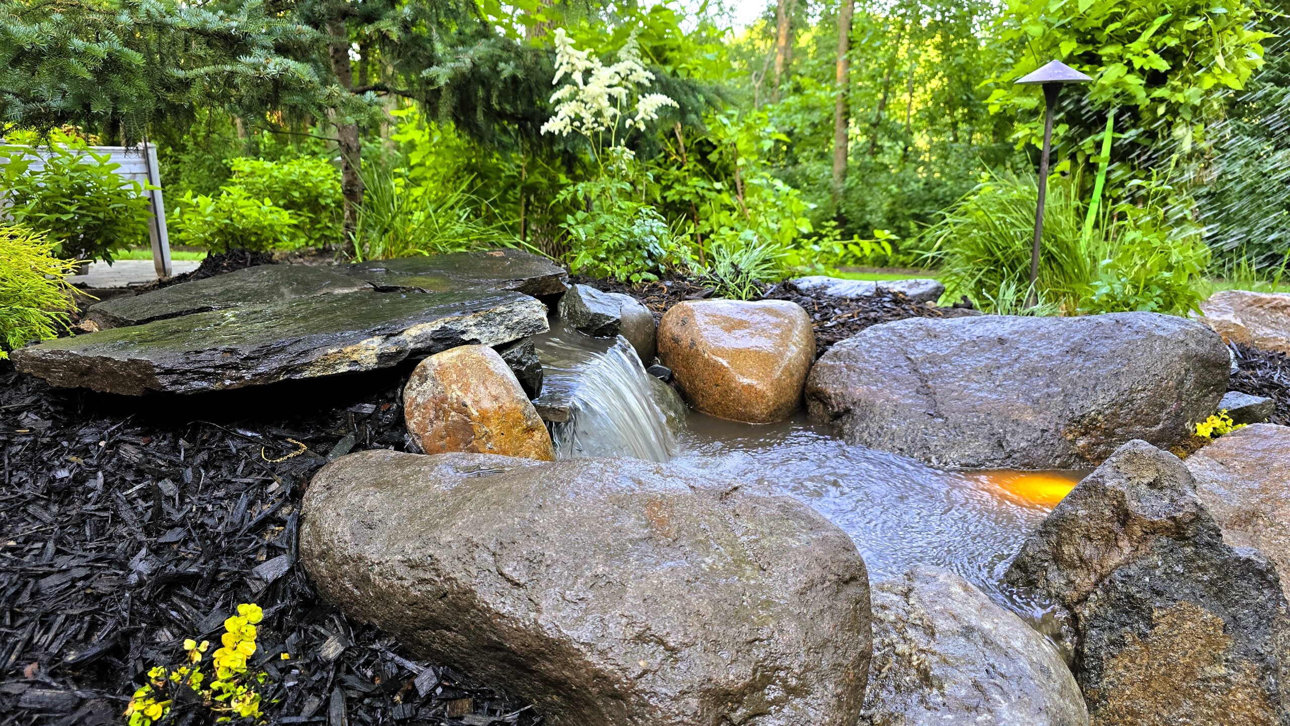 Minnesota Granite Waterfall Construction Decorative granite waterfall construction in Eden Prairie, MN