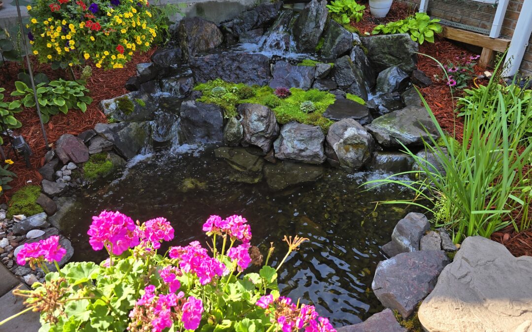 Front Yard Waterfall Rebuild with Banded Jasper Boulders — Blaine, Minnesota