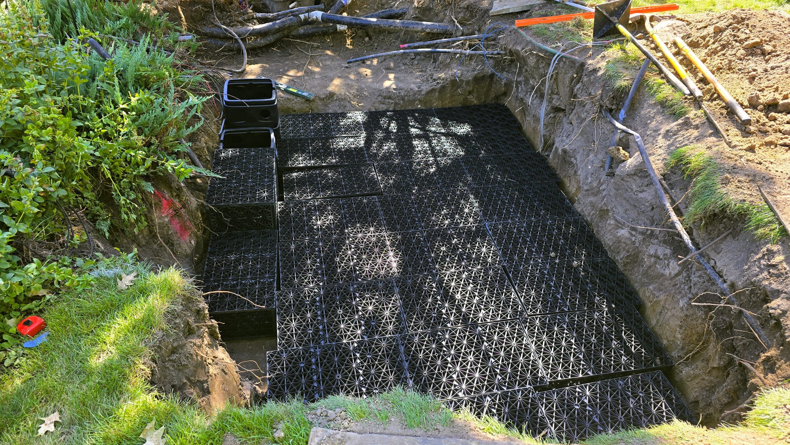  Intake bay installation with AquaBlox system for large swimming pond, improving water circulation and filtration in Orono, Minnesota